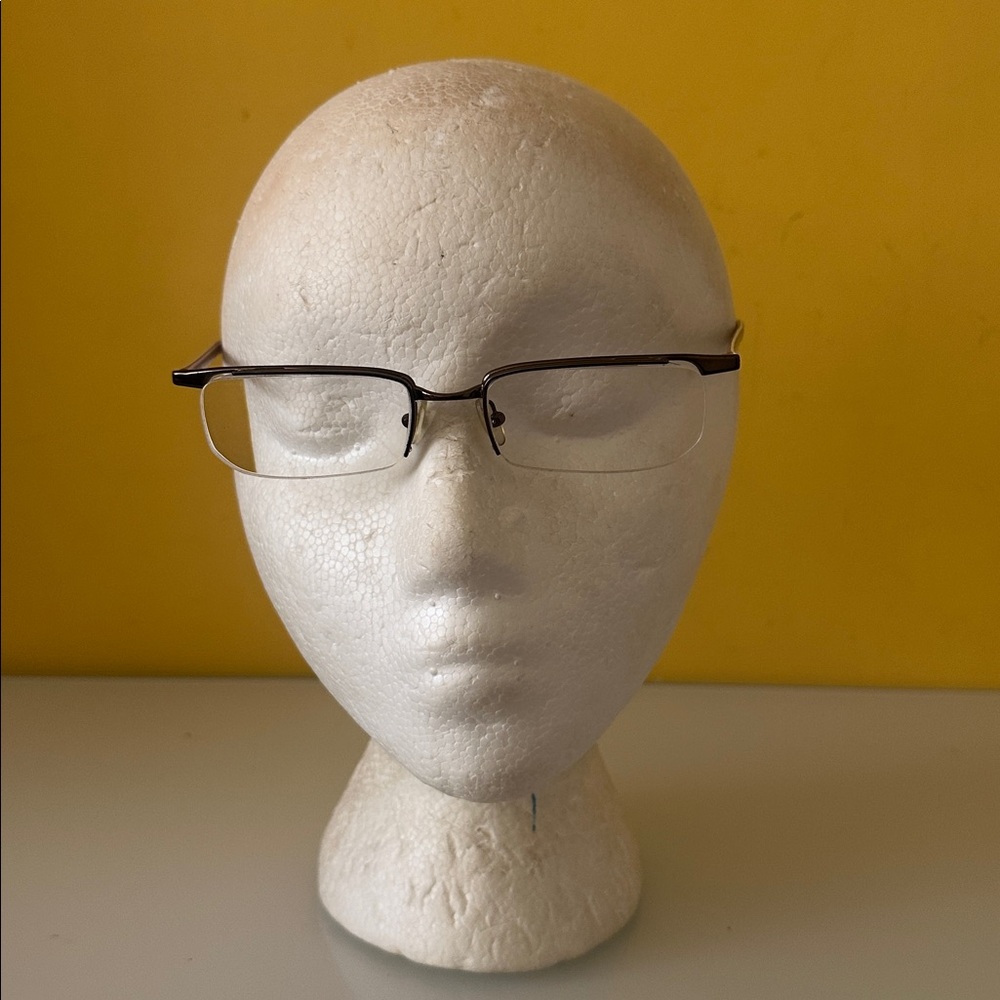 Prada Sleek Bronze Titanium Frameless Rectangular Prescription Glasses Frame